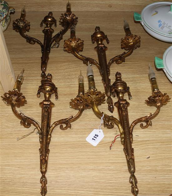 A set of four Louis XVI style gilt metal two branch wall sconces H.16in.